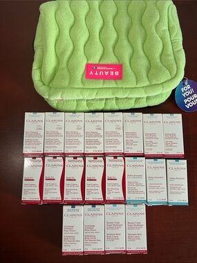 20 pieces Clarins Assorted Skincare Samples with Lime Green Quilted Pouch